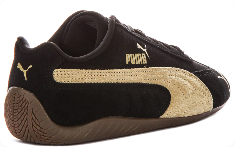 Puma Speedcat OG Black Pale Gold – Rear three-quarter view showing gold Formstrip and gum outsole